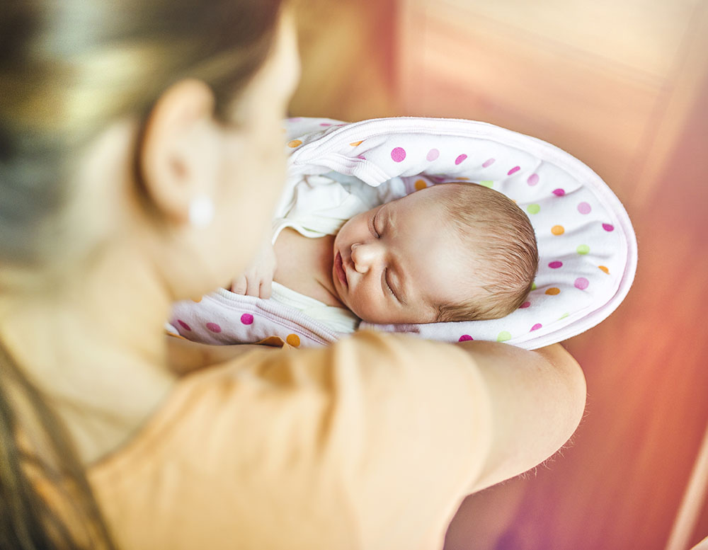 Mother with baby at home HypnoBirthing®International The Mongan Method